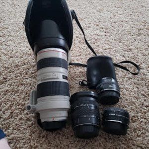 3 Digital camera lenses  1 Extension tube